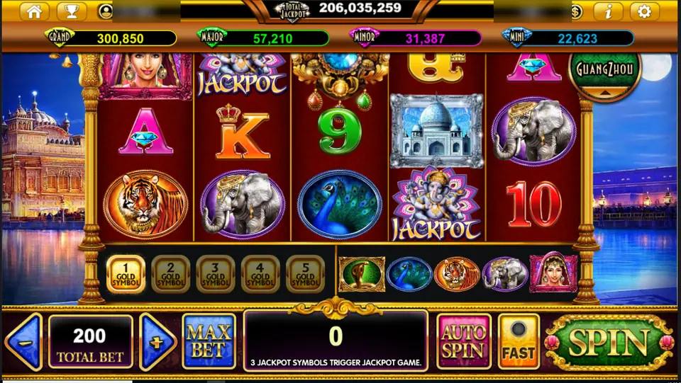 The Taj Majestic reels with a woman in a red veil, a tiger, elephants, a peacock, the Taj Mahal and two Ganesha JACKPOT symbols, total bet 200