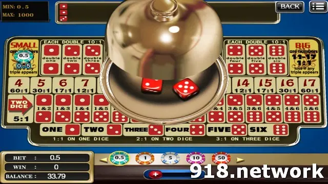 Sic Bo on 918Kiss with a gold dome over the dice and Small, Big, totals and double bets on the board