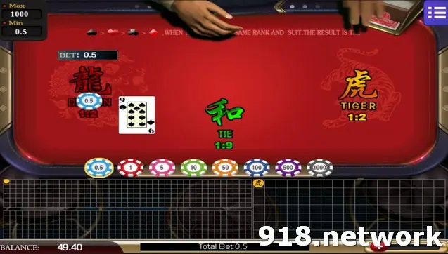 Dragon Tiger on Mega888, a red table with a dragon card dealt, chips from 0.5 to 1000 and the tie at 1:9