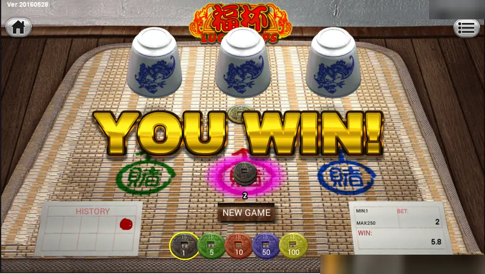 Fu Bei Lucky Cups winning round: the coin found under the middle cup, a bet of 2 and a win of 5.8